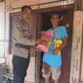 Sat Binmas Polres Touna Salurkan Bantuan Beras dan Minyak Goreng di Desa Sumoli