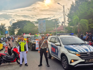Polres Touna Terjunkan Personel Amankan Karnaval Budaya PGRI di Ampana Kota